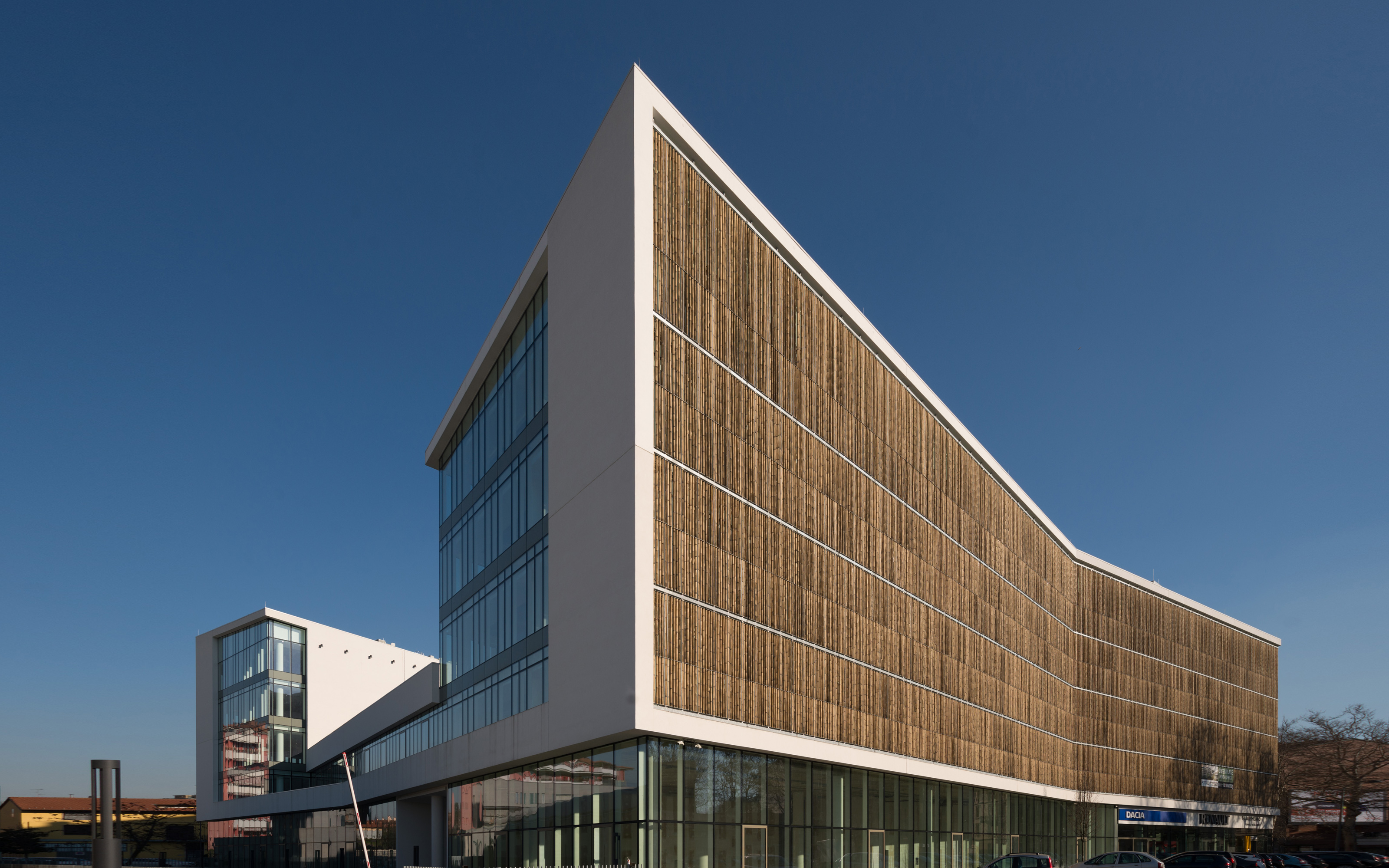 Building with bamboo lamellae on the facade